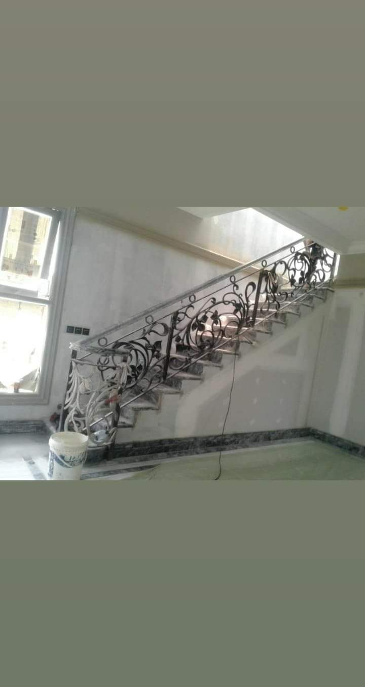 Desain Railing Tangga Besi Tempa Klasik Pemalang untuk Interior Megah